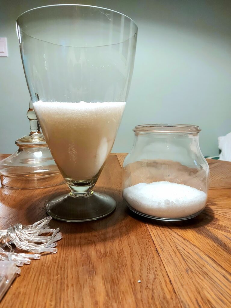 glass vase and jar with salt inside