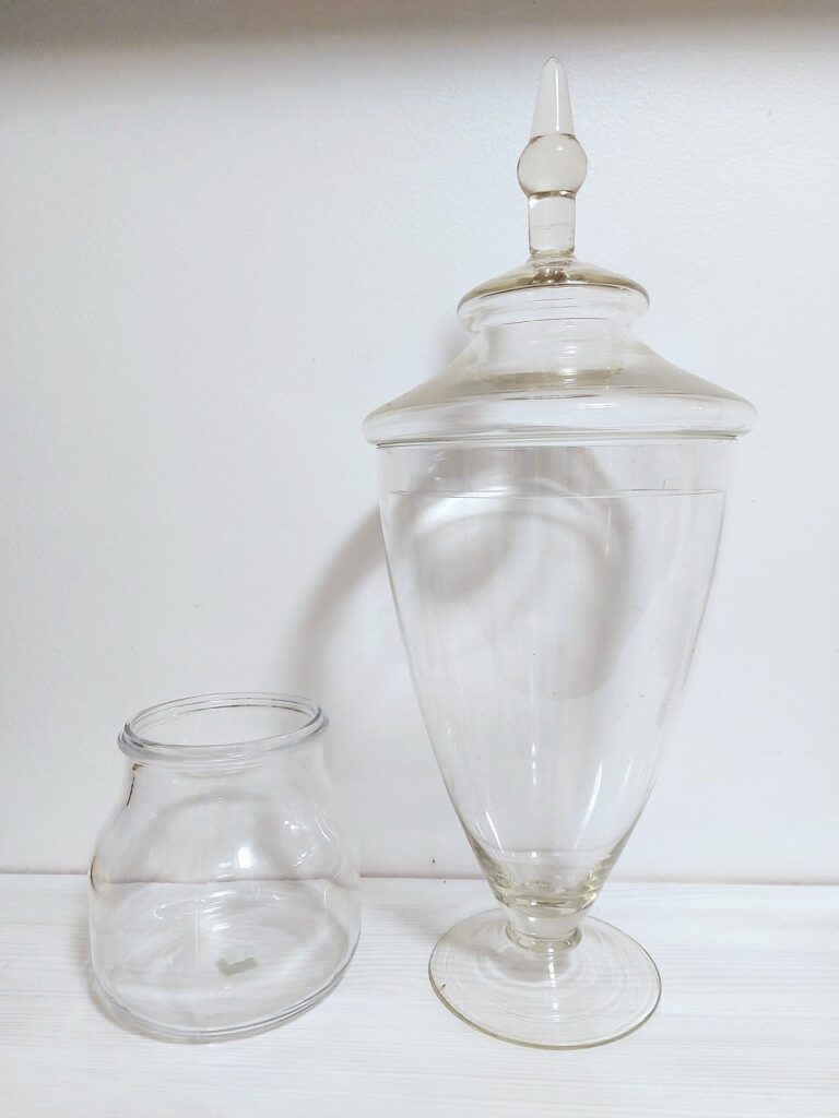 large glass vase with lid and small glass jar