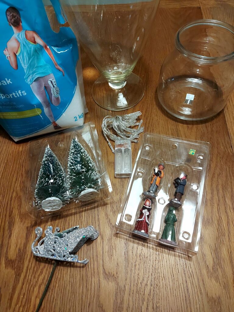 christmas figurines, christmas tree, fairy lights, glass jar, and salt