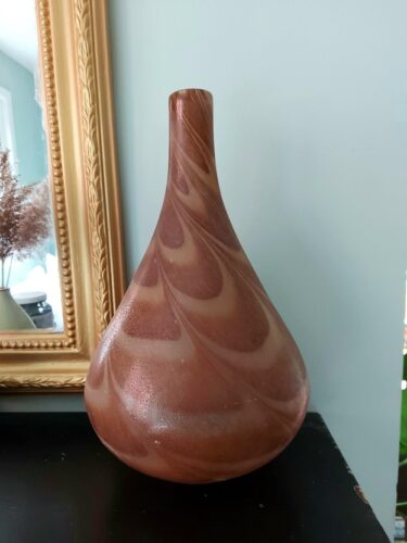 Thrifted pale orange swivel vase