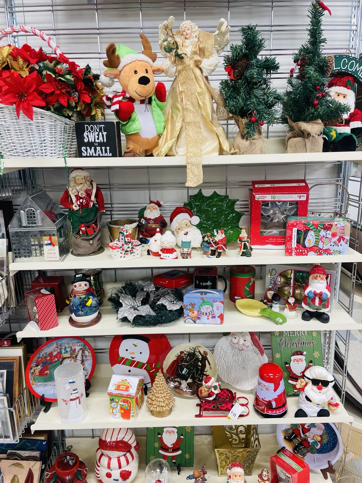 Christmas and holiday decorations and décor on a shelf at the Thrift Store