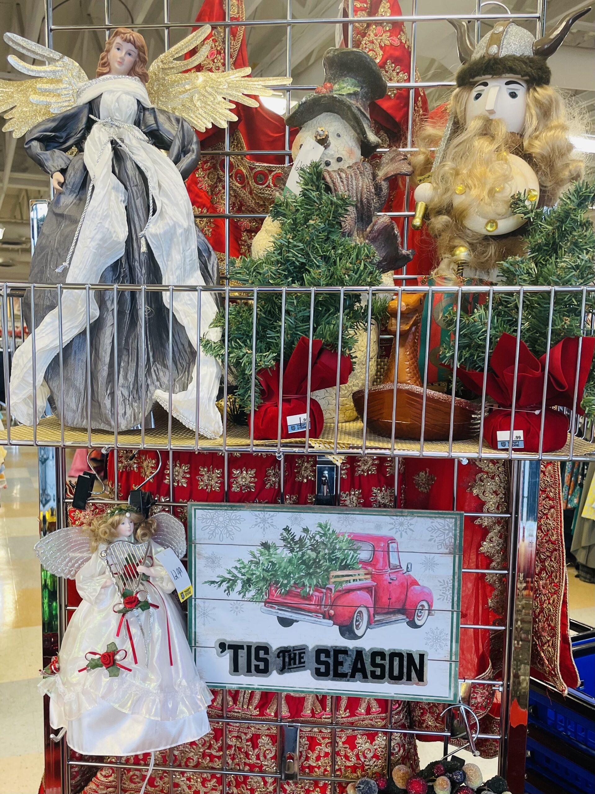 Christmas and holiday decorations and décor on a shelf at the Thrift Store