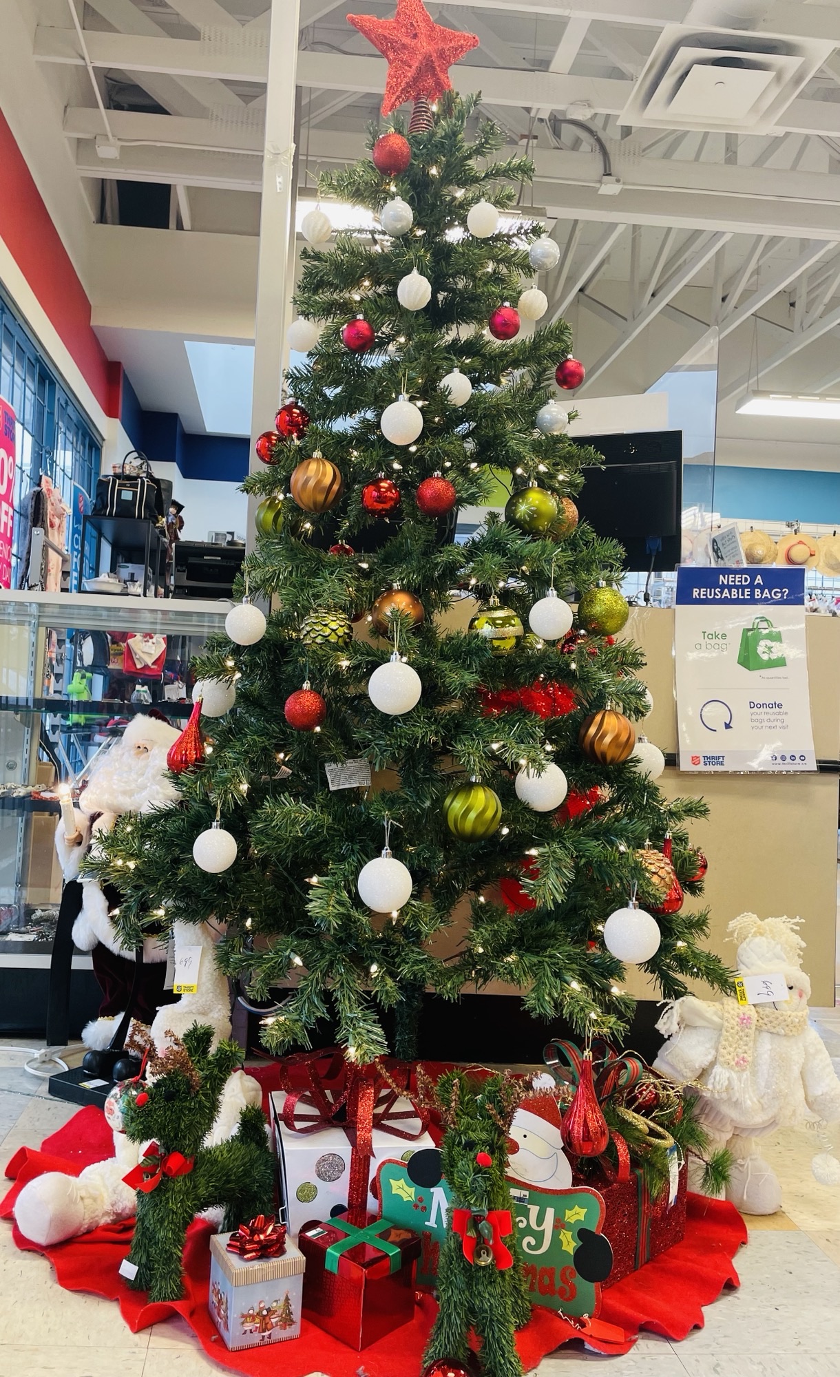 Christmas and holiday decorations and décor on a shelf at the Thrift Store