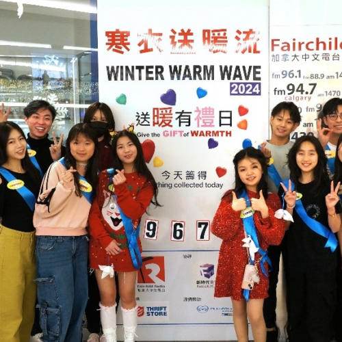 People celebrating donations collected during donation drive