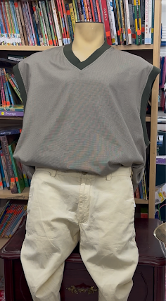 back to school sporty outfit sweater vest and beige shorts