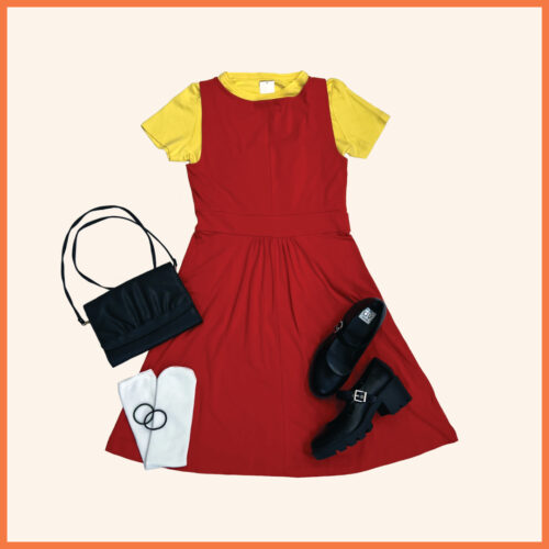 yellow t-shirt, orange dress, black purse, white ankle socks, black mary jane shoes, 2 hair ties