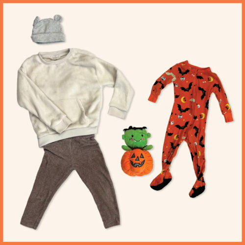 infant orange onesie with bats. Another outfit with white fuzzy long sleeve, brown pants, and bear hat