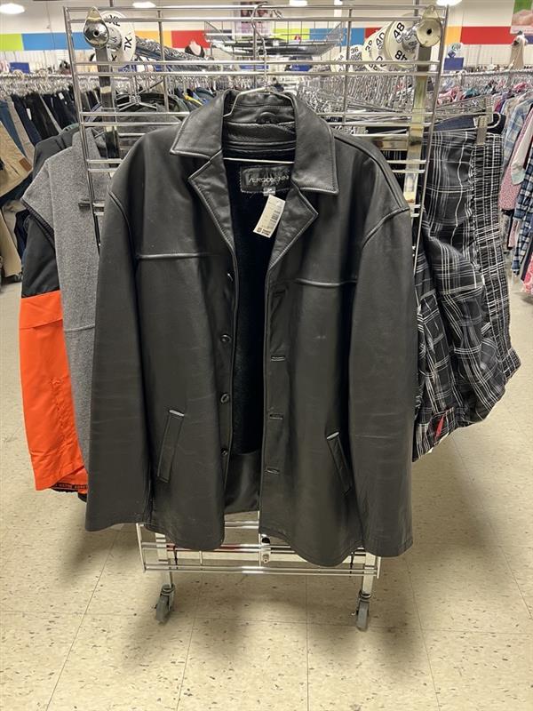 black Men's leather coat hanging on the end of an aisle rack