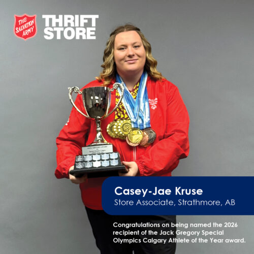 Casey posing with trophy in hand